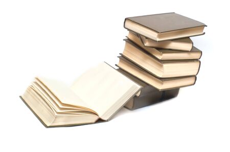 Books stack isolated on white backgroundの写真素材