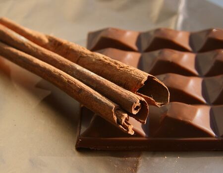 Milk chocolate and cinnamon sticksの写真素材