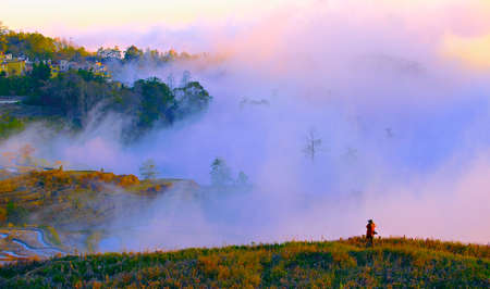 Mountain landscape with fog in the morning at Mae Hong Son province, Thailand.の写真素材
