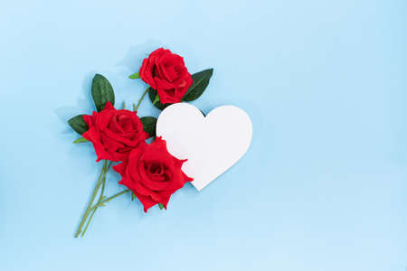 beautiful roses with a heart, a background for messages, a creative concept for Valentine's Day or Mother's Dayの写真素材