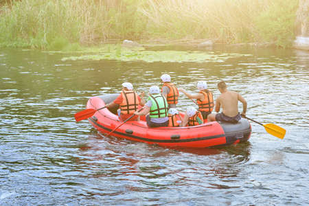 Ukraine Migea. 12 june 2018. Pivdennyi Buh. A group of people makes rafting in the waters of the river. White water raftingのeditorial素材