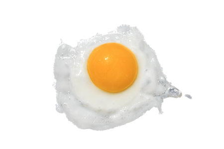 Fried egg isolated on white background. Top viewの写真素材