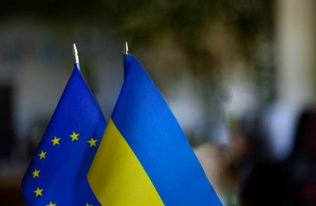 Flags of Ukraine and EU. partnerships between countries. Concept of Ukraines accession to European...