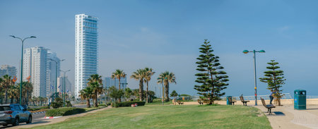 Netanya, Israel - May 16, 2023: Panoramic view of the building of the coastal Island Suites Hotel against the blue sky. Embankment in Netanyaのeditorial素材