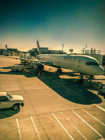 Hartsfield-Jackson Atlanta international Airport with a view of Delta Airlines plane and preparing for departureのeditorial素材