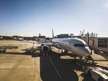 Hartsfield-Jackson Atlanta international Airport with a view of Delta Airlines plane and preparing for departureのeditorial素材