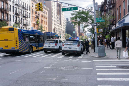 New York, NY / USA - September 11 2020: NYPD Police cars in East Village on 3rd Avenueのeditorial素材