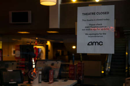 New York / USA - October 15 2020: a note on a window of an AMC theatre regarding closure due to covid-19のeditorial素材