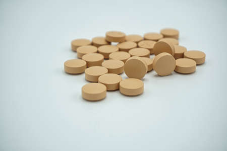 Pile of pharmaceutical medicine pills, tablets and capsules. Copy space for text.の写真素材
