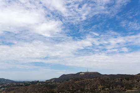 Los Angeles, USA - August 9 2021: Hollywood sign as an american famous landmark. Aerial view of Hollywood Hills of Santa Monica Mountainsのeditorial素材