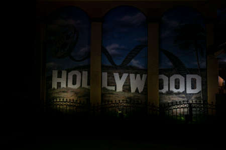 Hollywood, USA - August 10 2021: Hollywood letters on a wall background. Movie and entertainment signのeditorial素材