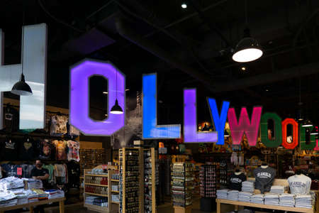 Hollywood, USA - August 10 2021: Interior of souvenir shop in Hollywood, LA. Many accessories and shirts in Hollywoodland storeのeditorial素材