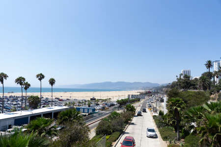 Santa Monica, USA - 10 August 2021: Scenery of Santa Monica. Beach, mountains and highway along treesのeditorial素材