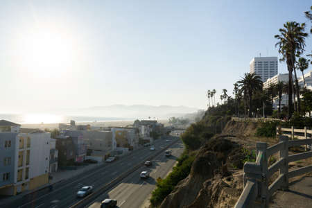 Scenery of Santa Monica. Beach, mountains and highway along treesの写真素材