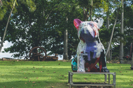 Guadeloupe, Le Moule - November 10 2022: A statue of modern artistic bulldog standing on the grassのeditorial素材