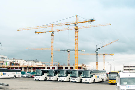Reykjavik, Iceland - July 12 2022: Bus station in Reykjavik with construction site behind and many cranesのeditorial素材