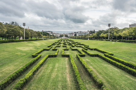 View of Eduardo VII park with labyrinth in Lisbon, Portugal on a cloudy dayの写真素材