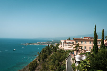 Hotel building in Taormina with accommodation for tourists on a hillのeditorial素材