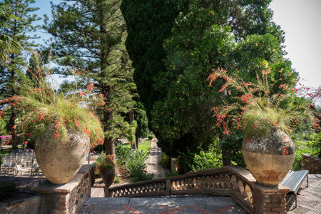 Villa comunale garden in Taormina. City park with landscaped gardens and picturesque views in Taormina, Sicily in Italyの写真素材