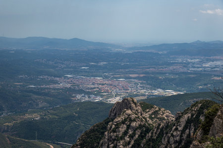 View of Montserrat in Catalonia, Spain. Rock formation with monastery in the backgroundの写真素材
