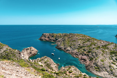 View of the sea and boats in Cadaques, Spain. Beautiful coastal landscape in Costa Bravaの写真素材