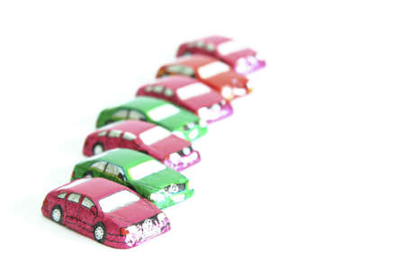 little chocolates in shape of car isolated on whiteの写真素材