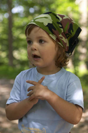 portrait of a child in the forest, on summertime tripの写真素材
