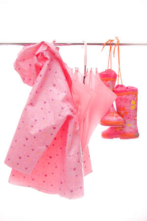 pink bad weather outfit isolated on whiteの写真素材