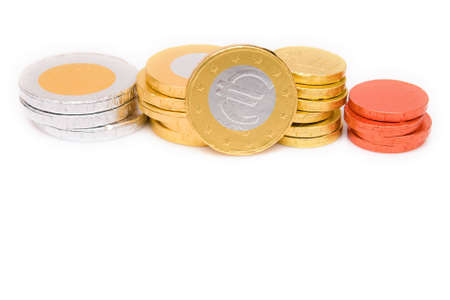 chocolate euro coins isolated on white backgroundの写真素材