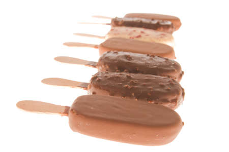 composition of chocolate ice cream sticks isolated on whiteの写真素材