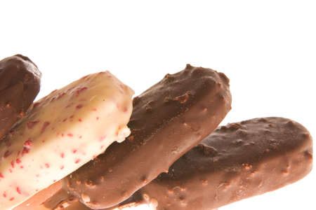 composition of chocolate ice cream sticks isolated on white