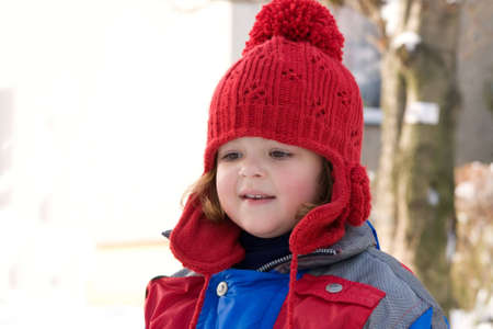 little girl - portrait in winter, snowy sceneryの写真素材