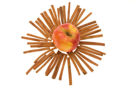 composition of apples and cinnamon isolated on whiteの写真素材