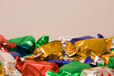 chocolates in colorful wrappings with cope spaceの写真素材