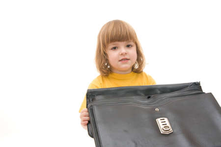 little happy girl playing with father's big bagの写真素材