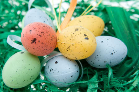 colorful Easter eggs and green grass