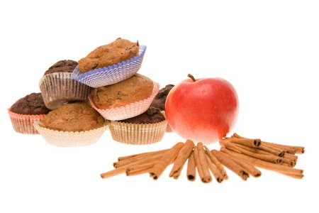 composition of appple, cinnamon and muffins isolated on whteの写真素材