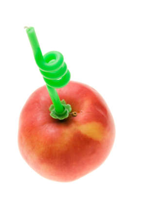 original birthday cake - apple with candle isolated on whiteの写真素材