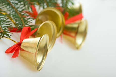 Christmas decoration - little golden bells and spruce