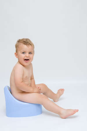 cute, little boy while potty trainingの写真素材