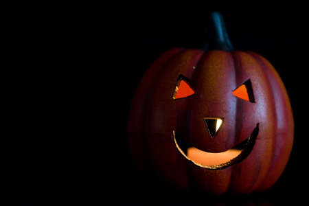 pumpkin as a jack o lantern, on blackの写真素材