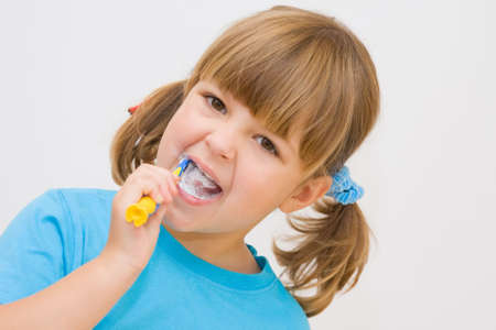 cute, little girl brushing her teethの写真素材