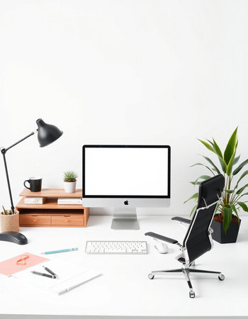 Mockup computer with blank screen on white desk. Workplace backgroundの写真素材