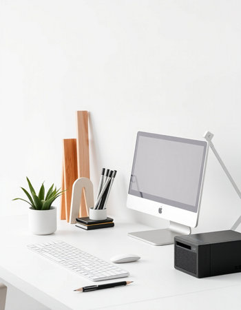 Modern workspace with computer, stationery and decorations on white table. Mock upの写真素材