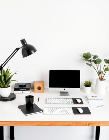 Workplace with computer, keyboard, mouse, coffee cup, notebook and plant on white wall background