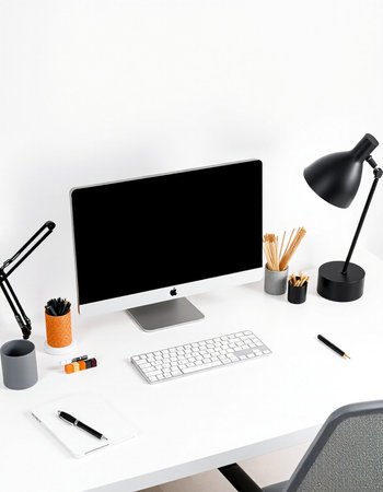 workplace with computer, lamp, stationery and mouse on white background