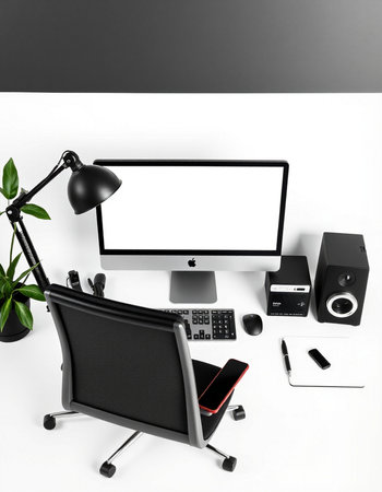 Workplace with computer, mouse, keyboard, mouse, keyboard, speaker and chair.