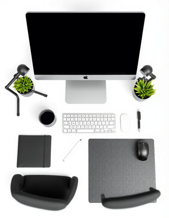Top view of modern workplace with computer, keyboard, mouse, coffee cup and other items.