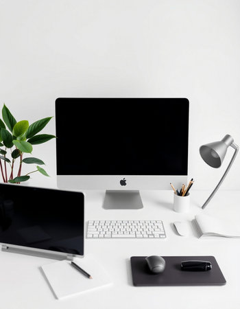 Creative designer workspace with blank computer screen, keyboard, mouse, stationery and plant. Mock...