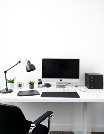 workplace with computer, keyboard, mouse, lamp and coffee cup